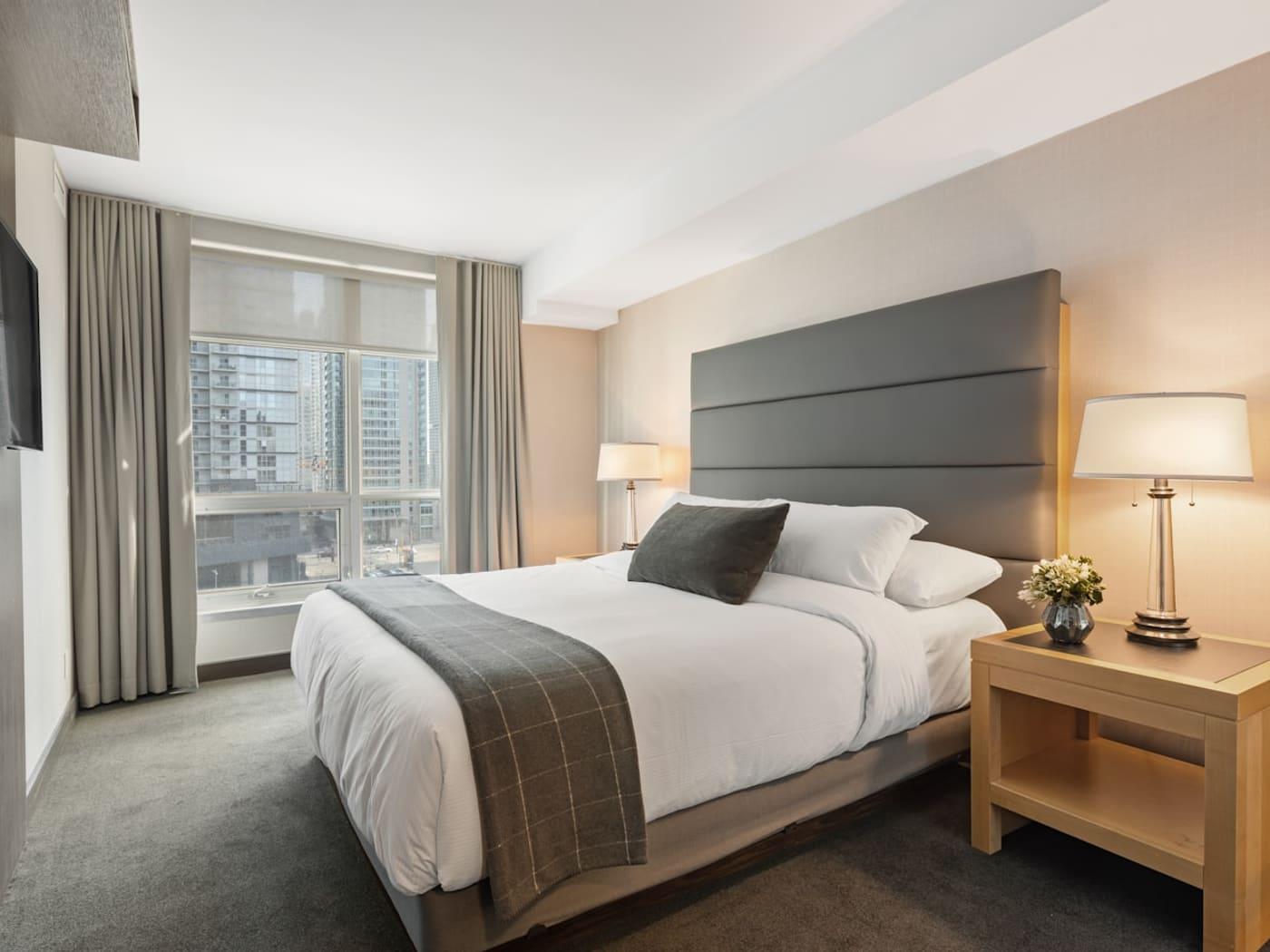 Guest-ready bedroom with fresh linens after Airbnb turnover cleaning